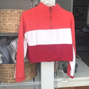 Cropped mock neck sweatshirt.